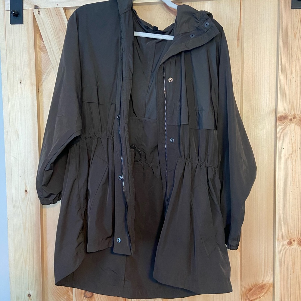 Athleta olive green rain jacket. Runs big